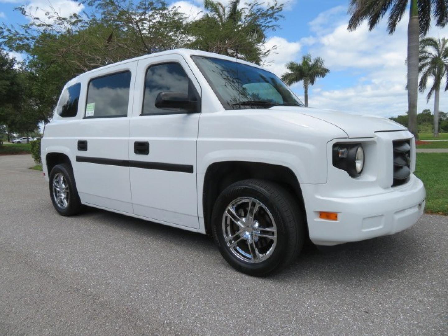 2012 White /Black with an 4.6L V8 engine, Automatic transmission, located at 4301 Oak Circle #19, Boca Raton, FL, 33431, (954) 561-2499, 26.388861, -80.084038 - You are looking at a Gorgeous 2012 Mobility Ventures MV1 Handicap Wheelchair Conversion Van with 64K Original Miles, 4.6L Ford V8, Bleack Leather Type Interior, Alloy Wheels, Power Side Entry Wheelchair Lift with Long Ramp and Short Ramp Function, Q Lock 150 EZ Lock, L-Track Tie Down System, Back Up - Photo#8